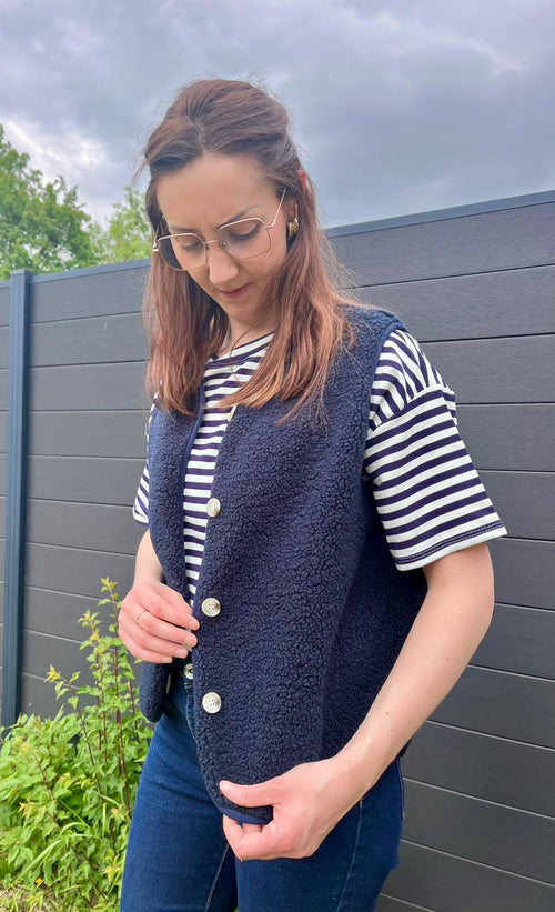 Gilet sans manches à boutons