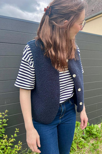 Gilet sans manches à boutons